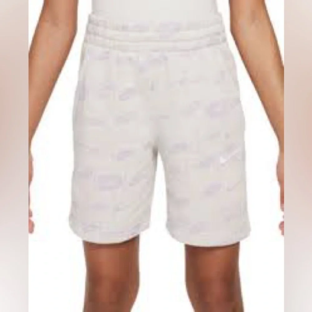 Nike standard fit shorts white‎ purple logo all over print kids size XS casual